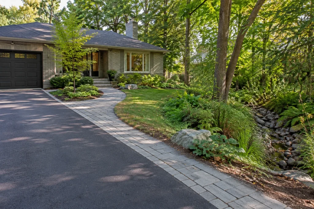 Residential access route avoiding a natural drainage corridor