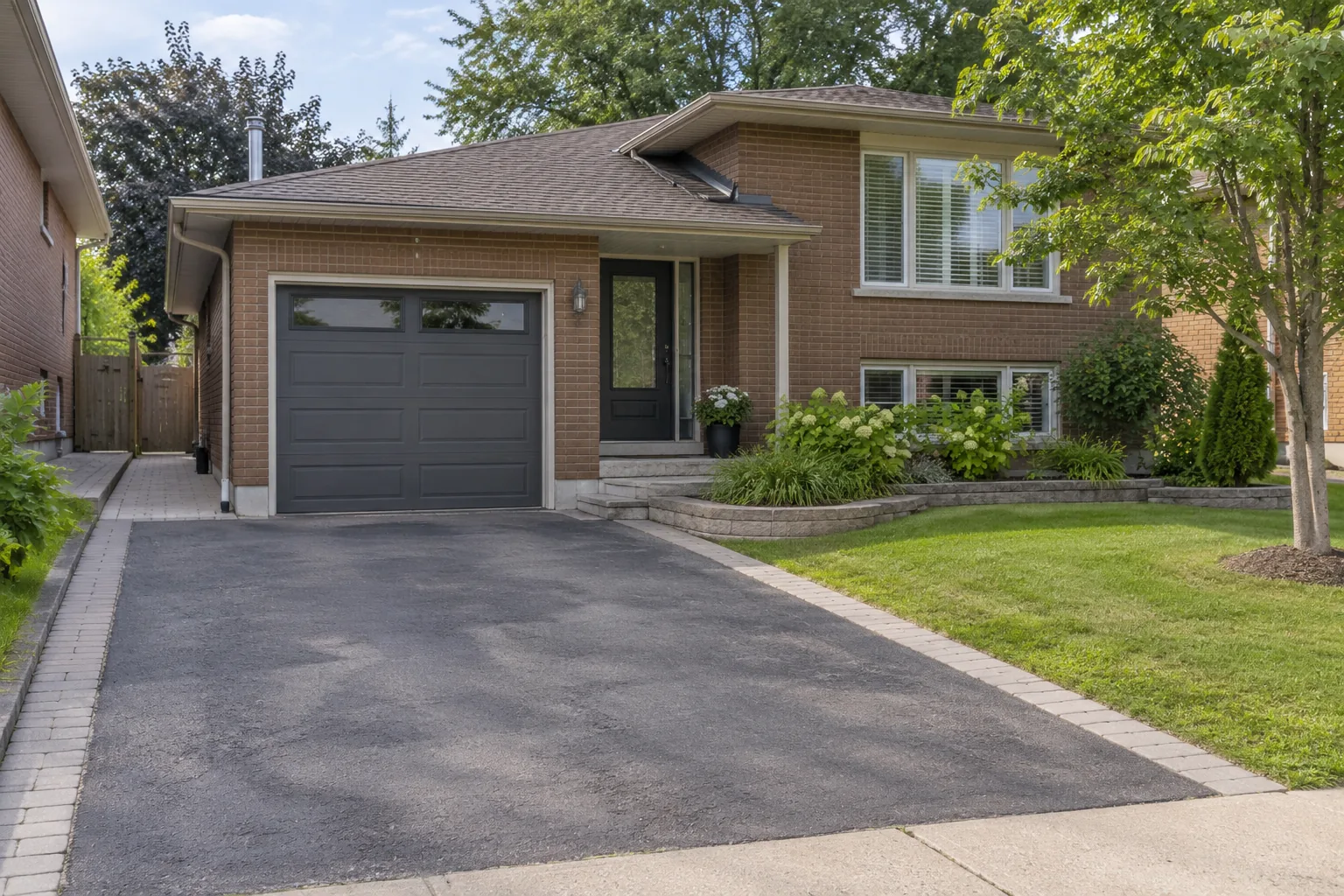 normal garage, driveway and clear porch route